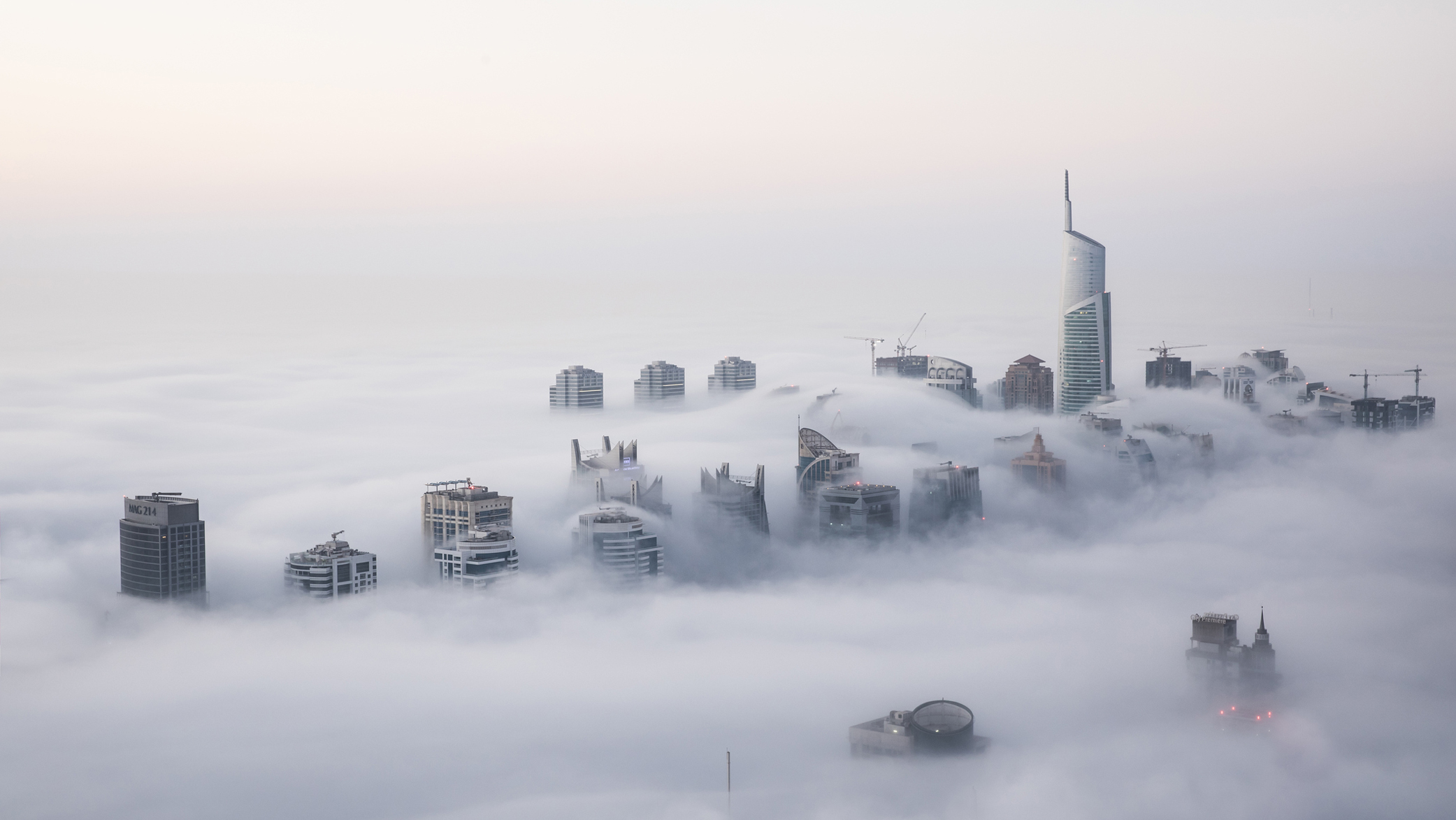 Aerial photo of Dubai in clouds